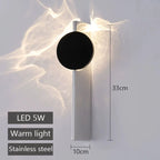 Wall-mounted light fixture with dimensions and features on a white background