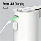 White electronic device with USB Type-C charging cable on a light gray background