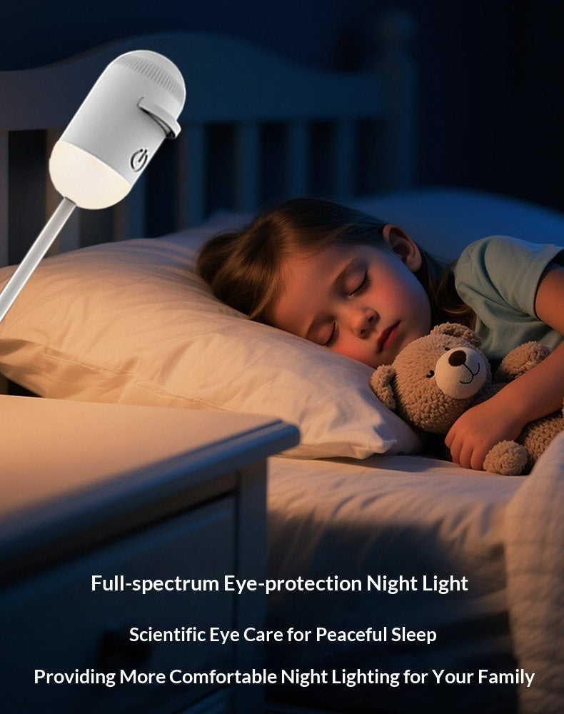 Child sleeping in bed with a teddy bear, using a full-spectrum eye-protection night light.
